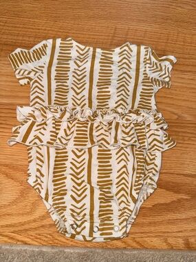 Kate Quinn Ruffled Baby One-Piece in White and Mustard Stripe